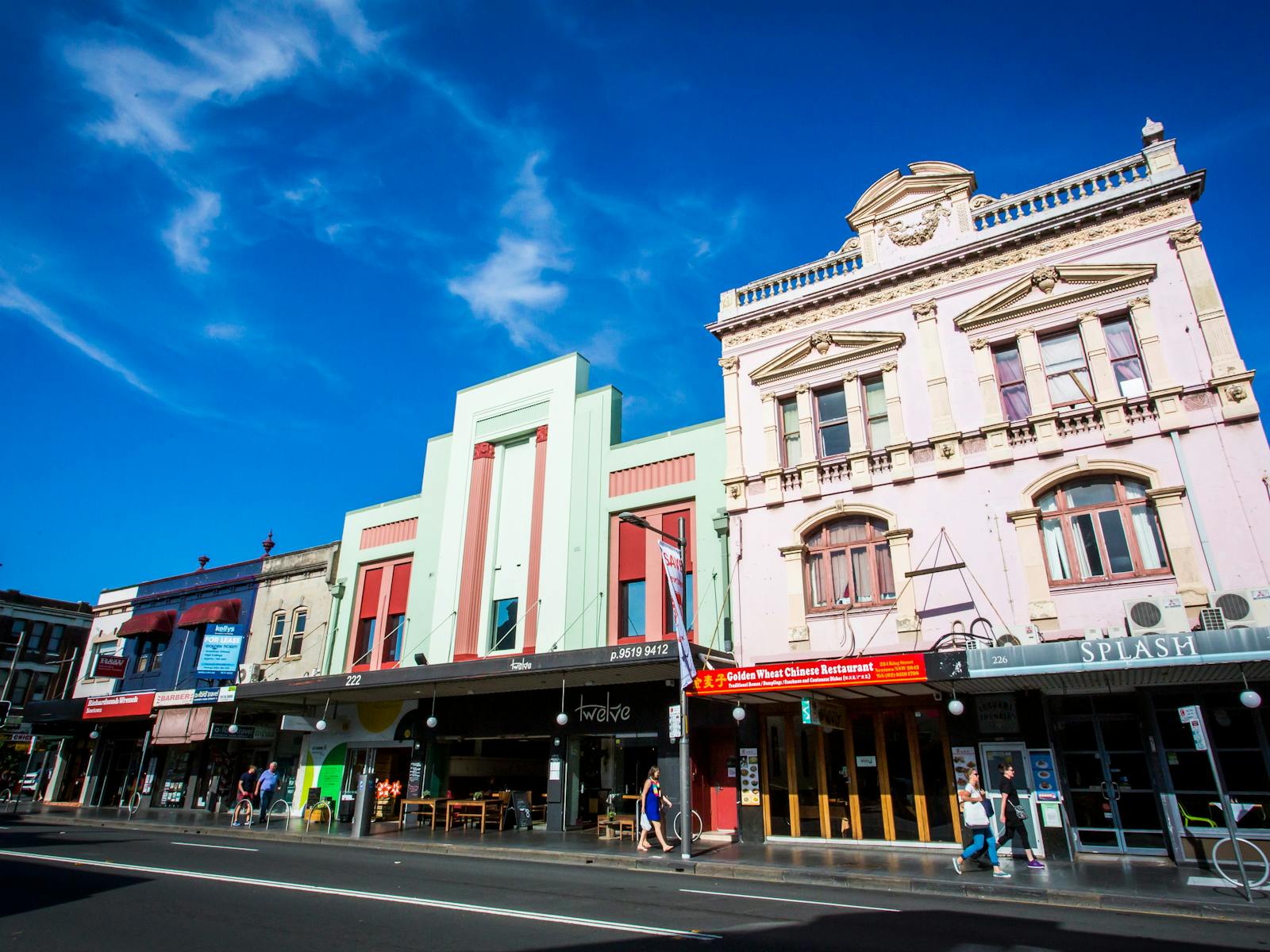 King Street shopfronts and heritage theatre building in Newtown, Sydney